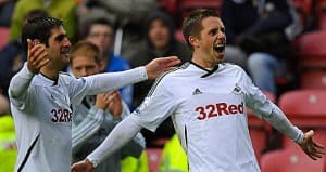 Gylfi Sigurdsson (z prawej)