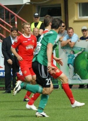 Krzysztof Ostrowski (w tle) wierzy, że kibice pomogą wygrać derby Łodzi