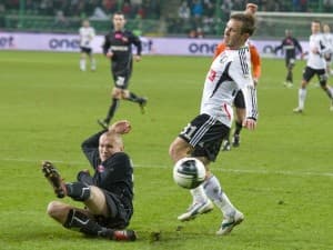 Łukasz Nawotczyński w starciu z Maciejem Rybusem