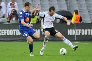 Miroslav Radović wraz z Jakubem Koseckim dedykują zwycięstwo Markowi Saganowskiemu